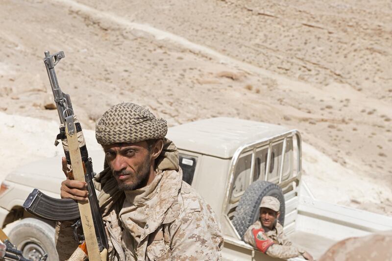 A Yemeni government fighter waits on the front line in battle against Shiite-Houthi rebels outside of Sana'a, Yemen, on Wednesday, Jan. 31. This is the front line of the war in Yemen -- and, some say, of Saudi Arabia’s wider struggle with Iran.  Photographer: Glen Carey/Bloomberg