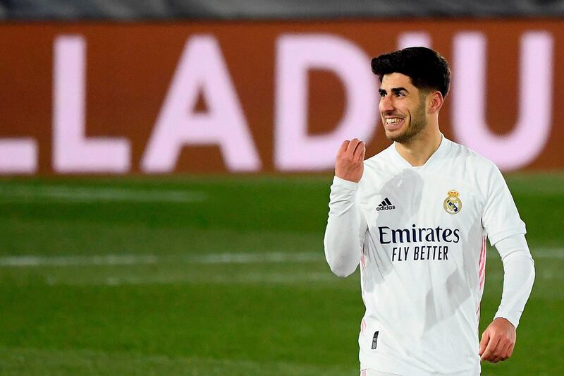 Real Madrid's Spanish midfielder Marco Asensio celebrates after scoring the second. AFP