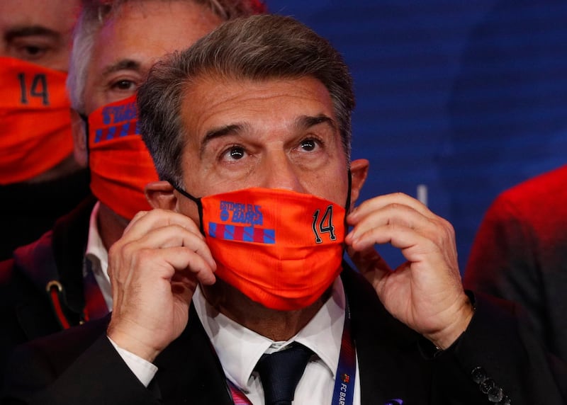 Newly elected FC Barcelona president Joan Laporta wearing a protective face mask before his press conference. Reuters