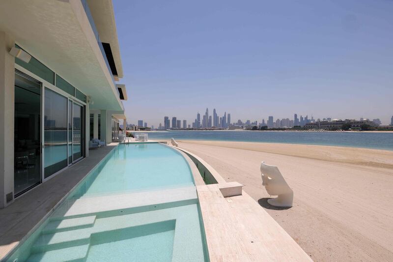 A private swimming pool on a luxury villa, located on the Palm Jumeirah. AFP