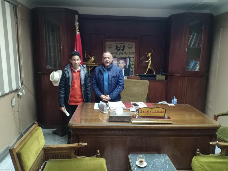 Youssef with Mostafa Waziri, secretary general of the Supreme Council of Antiquities of Egypt, who granted the teenager free admission to all museums in the country. Photo: Sami Hawas