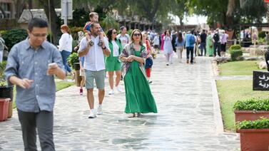 Visitors explore Heritage Village, Abu Dhabi. Khushnum Bhandari / The National