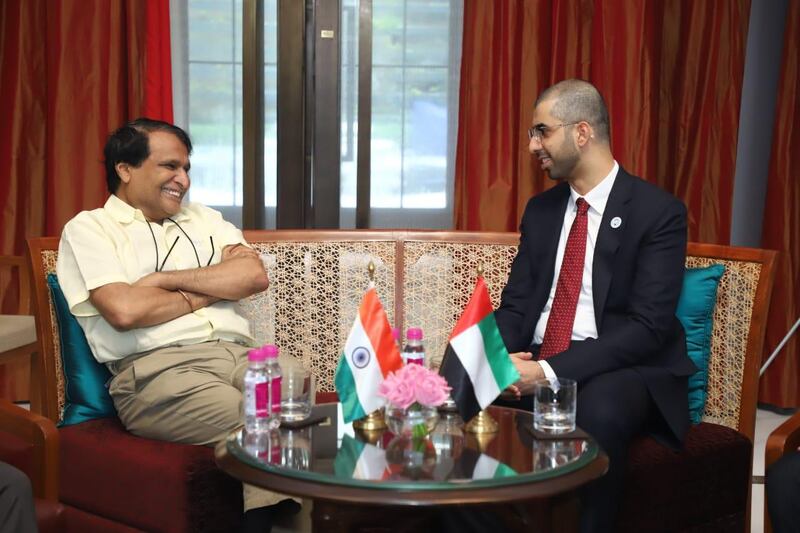 Omar Al Olama, Minister of State for Artificial Intelligence, and Deepak Bagla, managing director and chief executive of Invest India, form the India-UAE Artificial Intelligence Bridge. Courtesy Ministry of Cabinet Affairs and Public Diplomacy Office