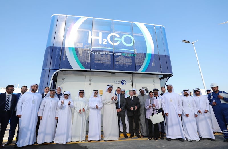 Dr Sultan Al Jaber, Cop28 President-designate, Minister of Industry and Advanced Technology, and managing director and group chief executive of Adnoc, with Suhail Al Mazrouei, Minister of Energy and Infrastructure, at the opening of the new hydrogen fuelling station. Chris Whiteoak / The National