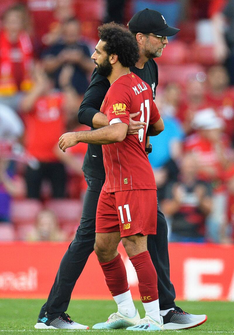 Salah with his manager Klopp post-match. EPA