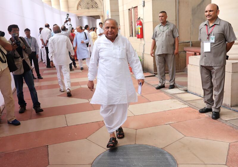 Samajwadi Party chief Mulayam Singh Yadav, centre, leaves after casting his vote at Parliament House in New Delhi, India, in July 2017. EPA