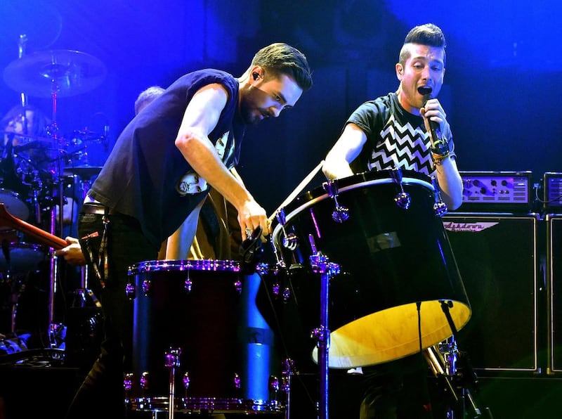 Kyle Simmons, left, and Dan Smith of Bastille perform at the 2014 iHeartRadio Music Festival at the MGM Grand Garden Arena in September in Las Vegas, Nevada. Kevin Winter / Getty Images for iHeartMedia / AFP