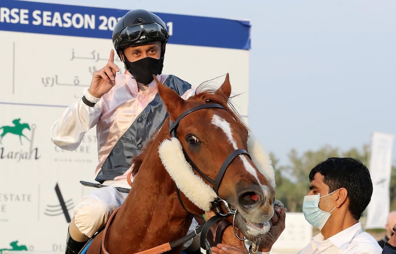 SHARJAH, UNITED ARAB EMIRATES , December 19 – 2020 :-  Royston Ffrench (no 6) guides Tailor’s Row (USA)  to win the 6th horse race HH Sheikh Ahmed bin Rashid Al Maktoum Cup 2000m dirt at the Sharjah Longines Racecourse in Sharjah. ( Pawan Singh / The National ) For Sports/Online. Story by Amith