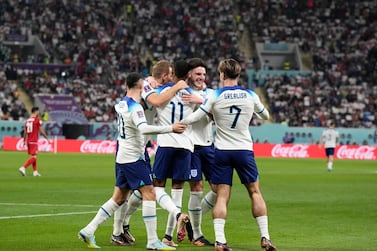 England's players celebrates after scoring their side's sixth goal against Iran during the World Cup group B soccer match between England and Iran at the Khalifa International Stadium, in Doha, Qatar, Monday, Nov.  21, 2022.  (AP Photo / Martin Meissner)