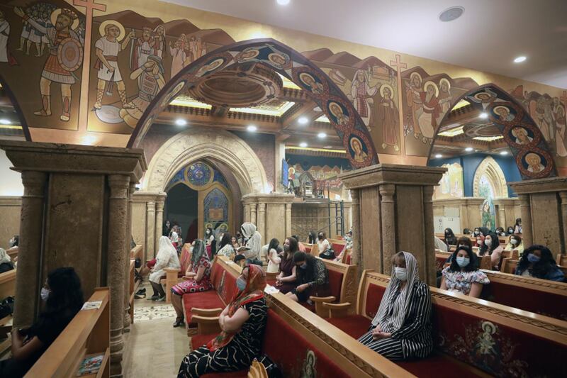 Orthodox Christians in Egypt attend an Easter Mass at a church in Heliopolis, Cairo. The Mass is celebrated at the end of 40 days of fasting. The Christian community makes up about 10 per cent of the Egyptian population of 100 million people. EPA