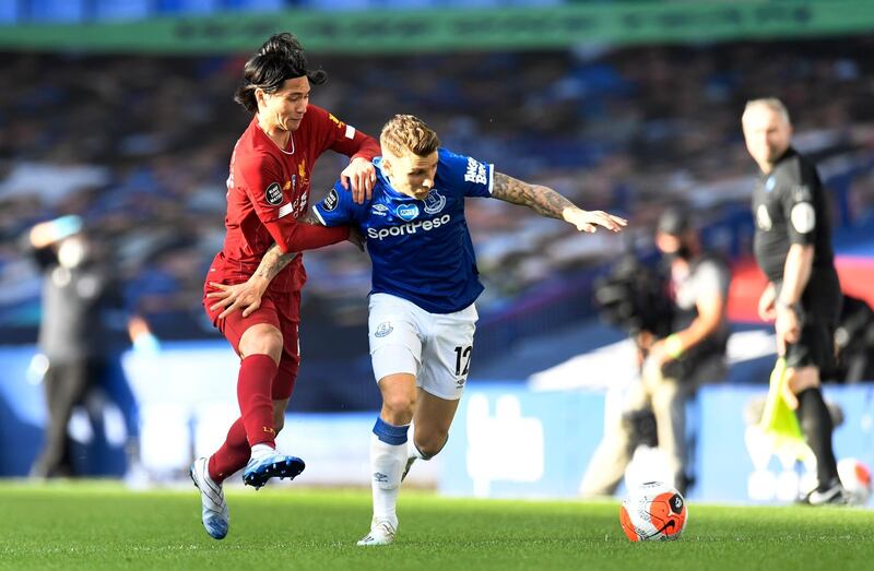 Takumi Minamino - 4, Big boots to fill standing in for Mohamed Salah, and the Japanese forward looked overawed by it. Subbed at half time by Alex Oxlade-Chamberlain. AP