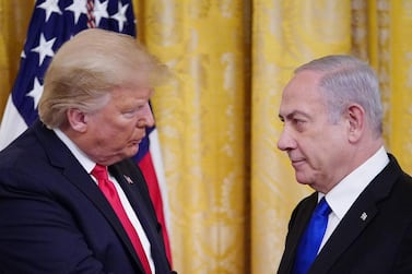 TOPSHOT - US President Donald Trump and Israel's Prime Minister Benjamin Netanyahu take part in an announcement of Trump's Middle East peace plan in the East Room of the White House in Washington, DC on January 28, 2020. Trump declared that Israel was taking a "big step towards peace" as he unveiled a plan aimed at solving the Israeli-Palestinian conflict. "Today, Israel takes a big step towards peace," Trump said, standing alongside Netanyahu as he revealed details of the plan already emphatically rejected by the Palestinians. / AFP / MANDEL NGAN