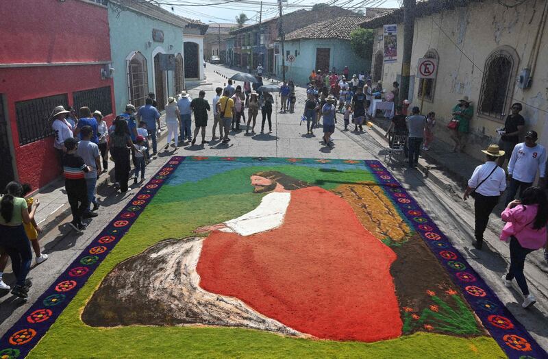A sawdust carpet depiction of Jesus Christ on a street in Comayagua, Honduras, during Holy Week. AFP
