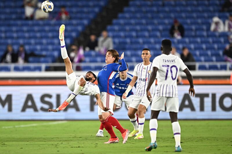 Al Ain's Emirati midfielder Mohammed Abbas attempts an overhead kick. AFP