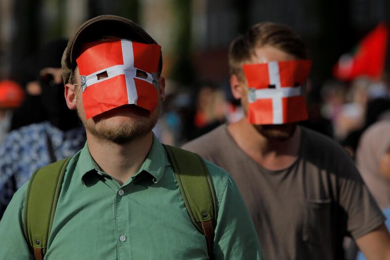 People participate in a demonstration against the Danish face veil ban. Reuters