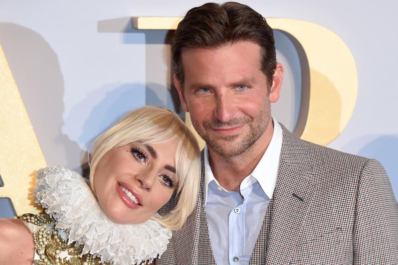 (FILES) In this file photo US singer/actress Lady Gaga (L) and US actor/director Bradley Cooper pose on the red carpet upon arrival for the UK premiere of the film "A Star is Born" in central London on September 27, 2018. Alfonso Cuaron's "Roma," an ode to his childhood in 1970s Mexico City, and offbeat royal romp "The Favourite" on January 22, 2019 topped the Oscar nominations with 10 each. Popular musical romance "A Star Is Born" and Dick Cheney biopic "Vice" finished with eight nominations each, while superhero blockbuster "Black Panther" finished with seven.So far, the awards season has been a bit surprising, with prizes sprayed among a variety of films. So Tuesday's announcement gives the race to the Academy Awards on February 24 a bit more clarity.
 / AFP / Anthony HARVEY
