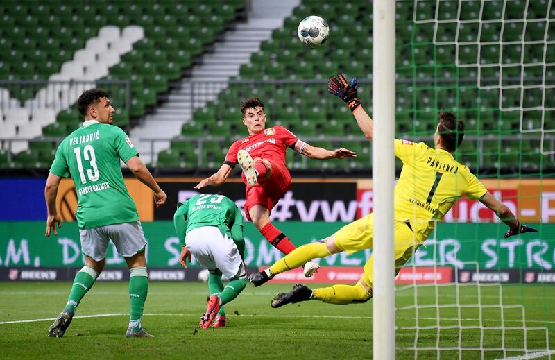 Soccer Football - Bundesliga - Werder Bremen v Bayer Leverkusen - Weser-Stadion, Bremen, Germany - May 18, 2020  Bayer Leverkusen's Kai Havertz scores their first goal, as play resumes behind closed doors following the outbreak of the coronavirus disease (COVID-19) Stuart Franklin/Pool via REUTERS  DFL regulations prohibit any use of photographs as image sequences and/or quasi-video