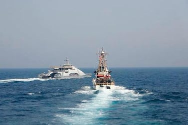 An April 2 photo released by the US Navy of an Iranian Revolutionary Guard vessel cutting in front of the US Coast Guard ship 'USCGC Monomoy' in the Gulf. AP 