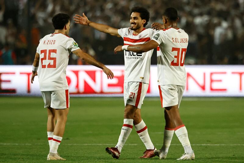 Zamalek midfielder Ahmed Hafez celebrates with teammates after scoring his team's first goal during the second leg of the CAF Confederation Cup final against Morocco's RS Berkane in Cairo on Sunday. AFP