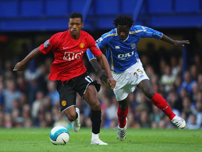 PORTSMOUTH, UNITED KINGDOM - AUGUST 15:  Nani of Manchester United goes past Benjani of Portsmouth during the Barclays Premier League match between Portsmouth and Manchester United at Fratton Park on August 15, 2007 in Portsmouth, England.  (Photo by Mike Hewitt/Getty Images)