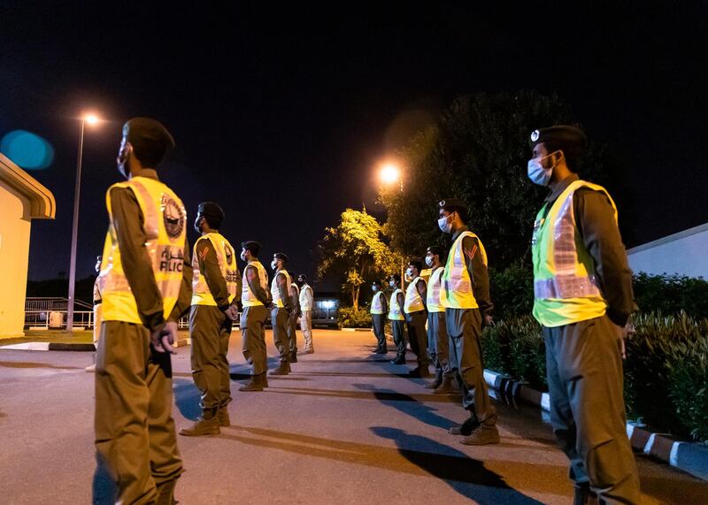 DUBAI, UNITED ARAB EMIRATES. 16 APRIL 2020. 
Dubai Mounted Police officers, in Al Aweer, line-up for a briefing before saddling up the horses. The patrols will head to residential and commercial areas to insure residents are staying safe indoors during COVID-19 lockdown. They patrol the streets from 6PM to 6AM.

The officers of the Dubai Mounted Police unit have been playing a multifaceted role in the emirate for over four decades. 

The department was established in 1976 with seven horses, five riders and four horse groomers. Today it has more than 130 Arabian and Anglo-Arabian horses, 75 riders and 45 groomers.

All of the horses are former racehorses who went through a rigorous three-month-training programme before joining the police force. Currently, the department has two stables – one in Al Aweer, that houses at least 100 horses, and the other in Al Qusais, that houses 30 horses.

(Photo: Reem Mohammed/The National)

Reporter:
Section: