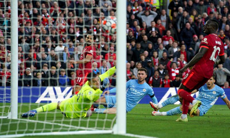 Mohamed Salah scores Liverpool's second goal. PA