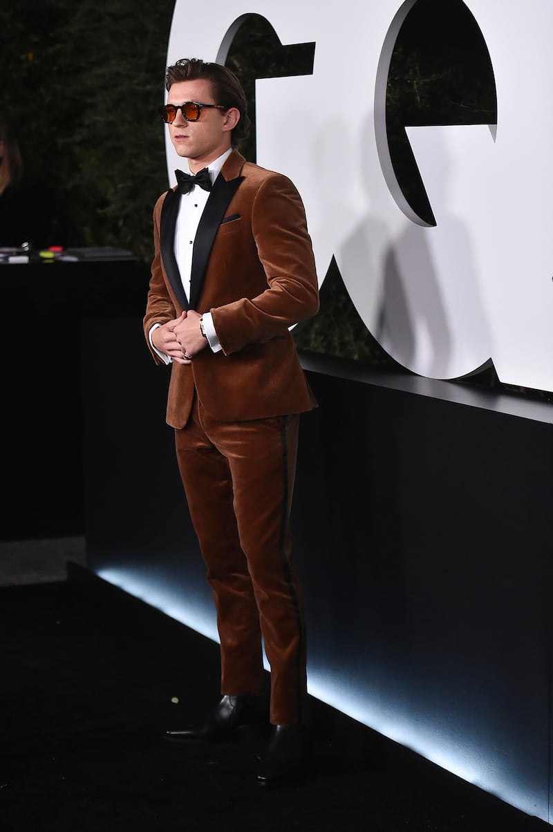 Tom Holland, in a brown velvet Boss tuxedo, attends the 2021 GQ Men of the Year Party on November 18, 2021 in West Hollywood. AP