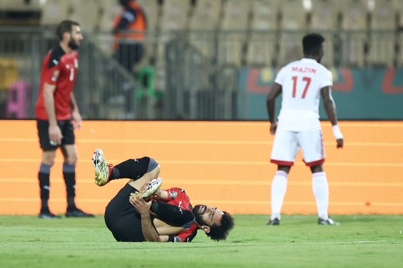 Sudan defender Mazin Mohamedein Alnour Mohamed walks away after leaving Egypt's Mohamed Salah injured. AFP