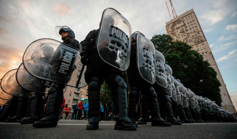 Riot police secure the Social Development Ministry in Buenos Aires, Argentina. AFP