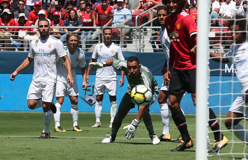 Real Madrid goalkeeper Keylor Navas watches as a Jesse Lingard opens the scoring for Manchester United. Beck Diefenbach / AFP