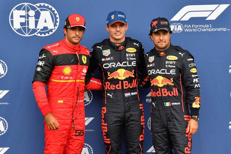 Ferrari's Carlos Sainz Jr, Red Bull Racing's  Max Verstappen and Sergio Perez after qualifying for the Belgian GP. AFP