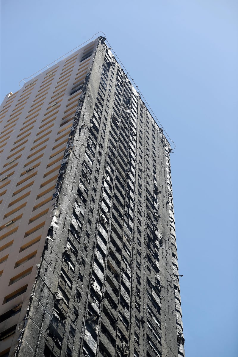 Sharjah, United Arab Emirates - Reporter: N/A: Fire. General View of Abbco Tower after a massive fire last night. Wednesday, May 6th, 2020. Sharjah. Chris Whiteoak / The National