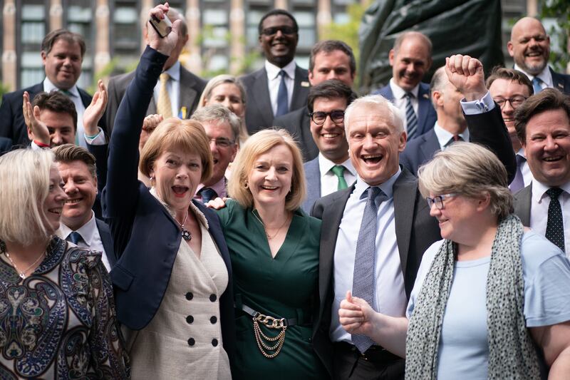 Ms Truss celebrates after being named, along with Mr Sunak, one of the final two candidates in the race to become the UK's next prime minister. PA
