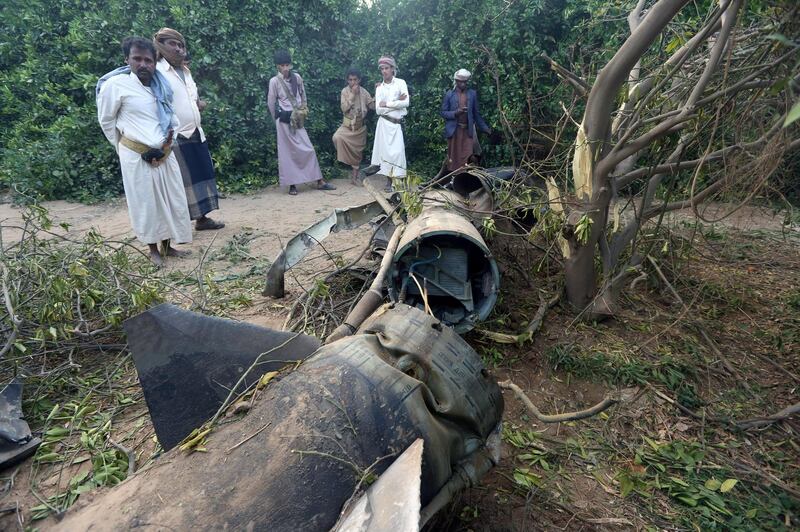 Tribesmen inspect fragments of a Houthi ballistic missile at a farm after it was intercepted by the Saudi-led coalition's air defence forces in Marib, Yemen February 23, 2018. Picture taken with a fisheye lens. REUTERS/Ali Owidha