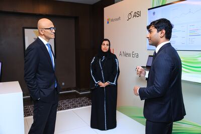 Satya Nadella, chairman and chief executive of Microsoft (left), Quddus Pativada, founder and chief executive of ASI (right), and Raghad Aljughaiman, adviser to the UAE Minister of Education, during Mr Nadella's visit to Abu Dhabi in November 2023. Photo: Microsoft
