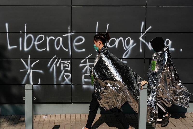 HONG KONG, CHINA - November 19: Unwell and injured protesters leave for hospital at The Hong Kong Poytechnic University on November 19, 2019 in Hong Kong, China. Anti-government protesters organized a general strike since Monday as demonstrations in Hong Kong stretched into its sixth month with demands for an independent inquiry into police brutality, the retraction of the word "riot" to describe the rallies, and genuine universal suffrage. (Photo by Anthony Kwan/Getty Images)