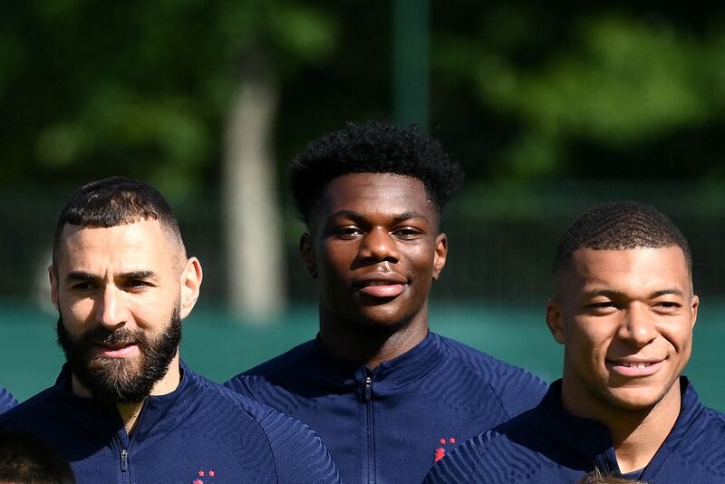 Real Madrid recruit Aurelien Tchouameni is flanked by Karim Benzema and Kylian Mbappe in France training. AFP