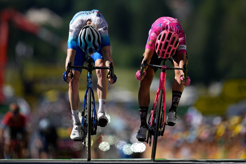 Australia's Nicholas Schultz and Magnus Cort of Denmark battle right to the finish line. AP