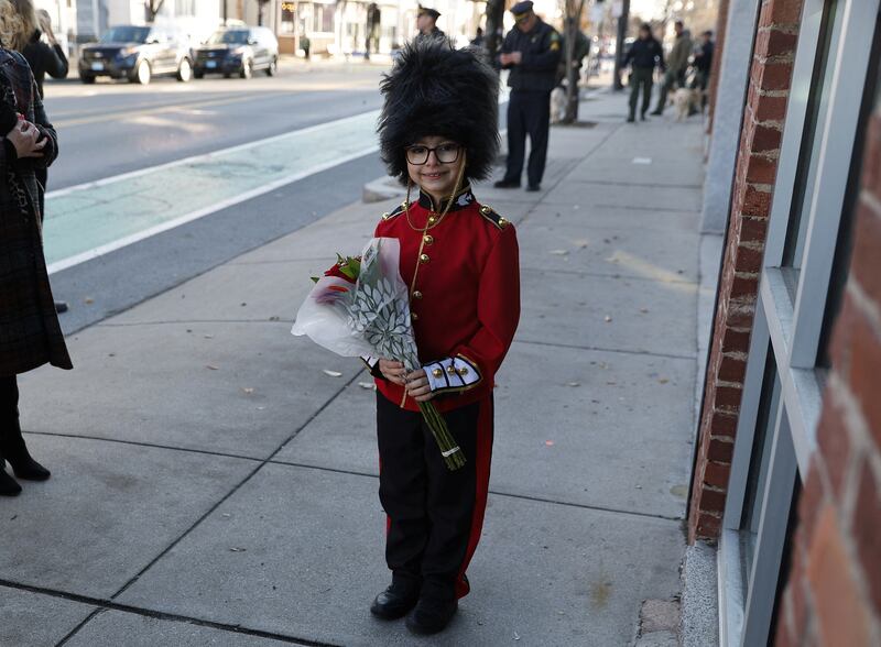 Henry told reporters that the royal couple had asked him what his name was, complimented his costume and thanked him for the flowers he brought. Reuters
