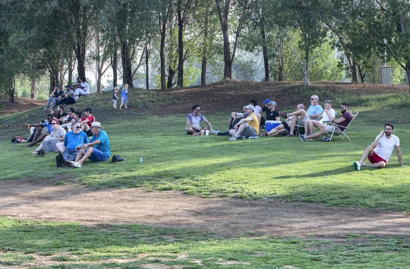 Ras Al Khaimah, United Arab Emirates -  People watching the game between RAK Rugby  (red) vs Dubai Sharks (blue) game at Al Hambra Golf Club.  Ruel Pableo for The National