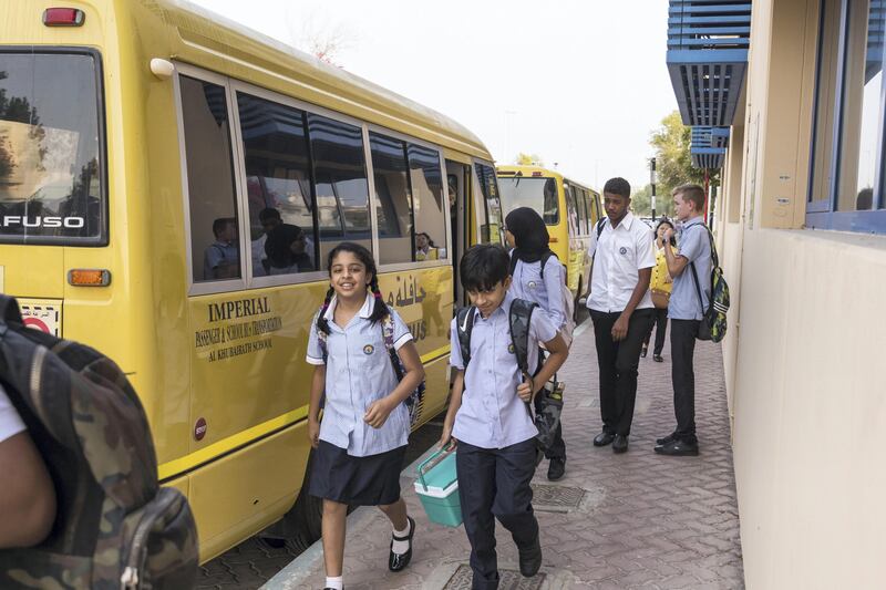 Abu Dhabi, UAE - September 10, 2017 - Students of British School of Al Khubairat arrive by school bus for their first day of the new year - Navin Khianey for The National