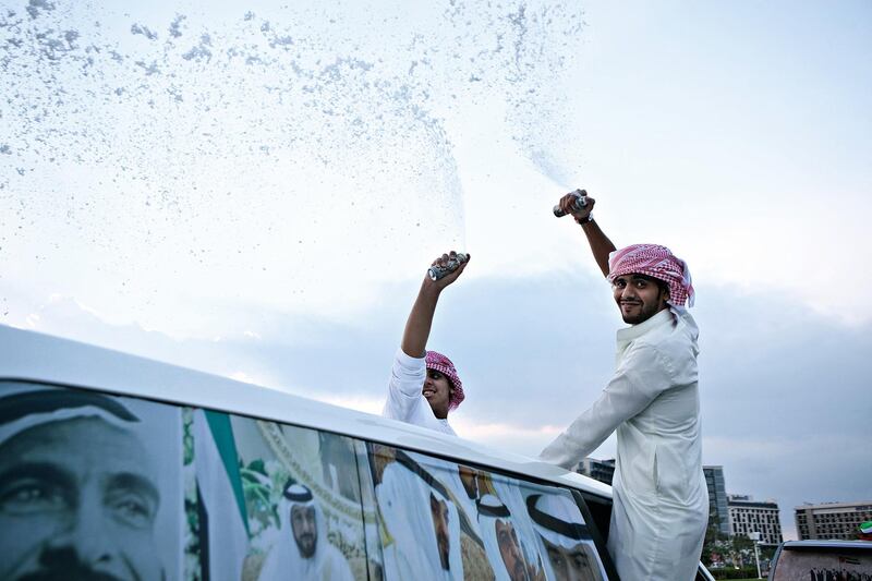 Abu Dhabi, United Arab Emirates, December 02, 2012:  
People celebrate the 41st UAE National Day on Sunday, Dec. 2, 2012, during the Union Car Parade on the Yas Island near Abu Dhabi.  Silvia Razgova / The National


