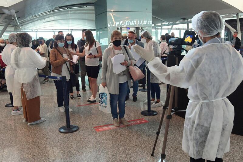 European tourists at the international airport near the Mediterranean town of Sousse in Tunisia. AFP