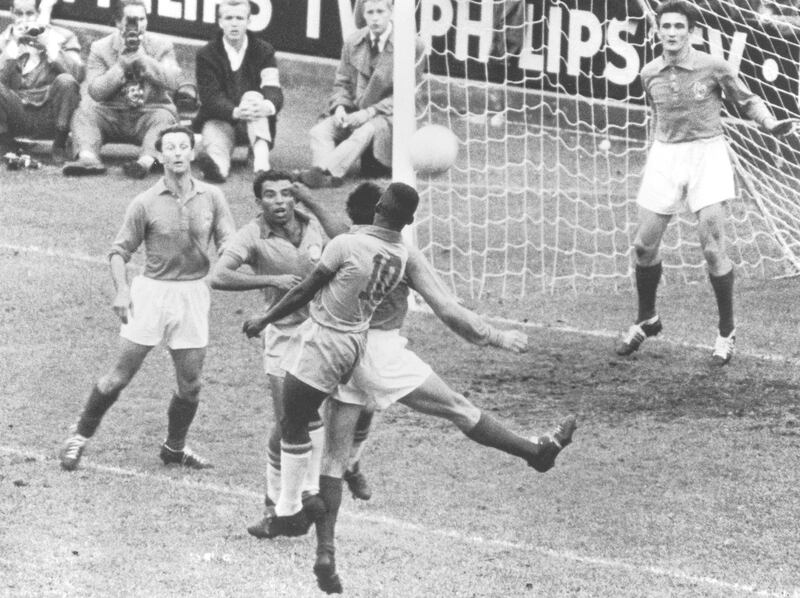 Brazilian forwards Vava and Pele (number 10) enter a melee in front of the French goal during the the World Cup semi-final at the Rasunda Stadion in Solna, Stockholm, 24th June 1958. Brazil beat France 5-2. (Photo by Keystone/Hulton Archive/Getty Images)