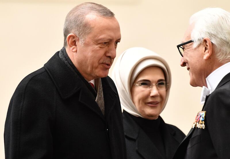 CORRECTION - Turkey's President Recep Tayyip Erdogan (L) and his wife Emine (R) are welcomed upon  arrival to meet with the Pope at the Vatican on February 5, 2018. / AFP PHOTO / Vincenzo PINTO / “The erroneous mention[s] appearing in the metadata of this photo by Vincenzo PINTO has been modified in AFP systems in the following manner: Turkey's President Recep Tayyip Erdogan instead of Turkish Prime minister. Please immediately remove the erroneous mention[s] from all your online services and delete it (them) from your servers. If you have been authorized by AFP to distribute it (them) to third parties, please ensure that the same actions are carried out by them. Failure to promptly comply with these instructions will entail liability on your part for any continued or post notification usage. Therefore we thank you very much for all your attention and prompt action. We are sorry for the inconvenience this notification may cause and remain at your disposal for any further information you may require.”