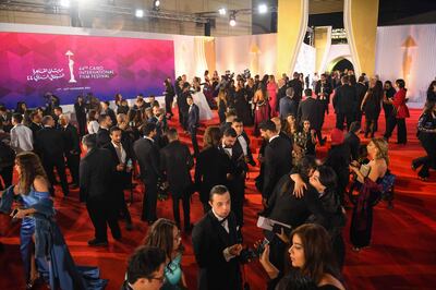 Attendees gather on the red carpet during the opening of the 44th edition of the Cairo International Film Festival. AFP