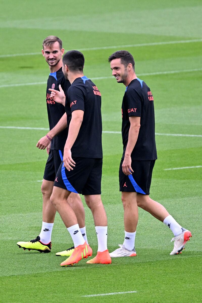 Fabian Ruiz, left, and Pablo Sarabia, right, during PSG's training. AFP