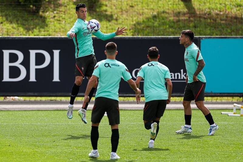 Portugal soccer team players (L-R) Cristiano Ronaldo, Joao Moutinho, Raphael Guerreiro, and Otavio Monteiro during the training session at Cidade do Futebol in Oeiras, outskirts of Lisbon, Portugal, 01 June 2022.  Portugal will play against Spain, Czech Republic and Switzerland for the upcoming UEFA Nations League.   EPA / JOSE SENA GOULAO