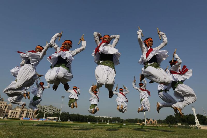 Students of Swaminarayan Gurukul in traditional attire practice Garba, a traditional dance of Gujarat state, ahead of Hindu festival Navratri in Ahmadabad.  Ajit Solanki / AP Photo