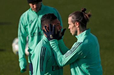 Real Madrid's Gareth Bale, right, and Casemiro during a training session at the team's Valdebebas training ground in Madrid. AP